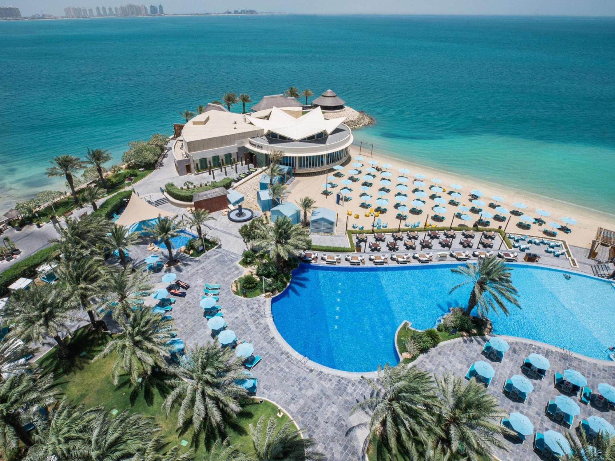 Hotel Hilton Ad Dawhah Esterno foto Aerial view of the resort