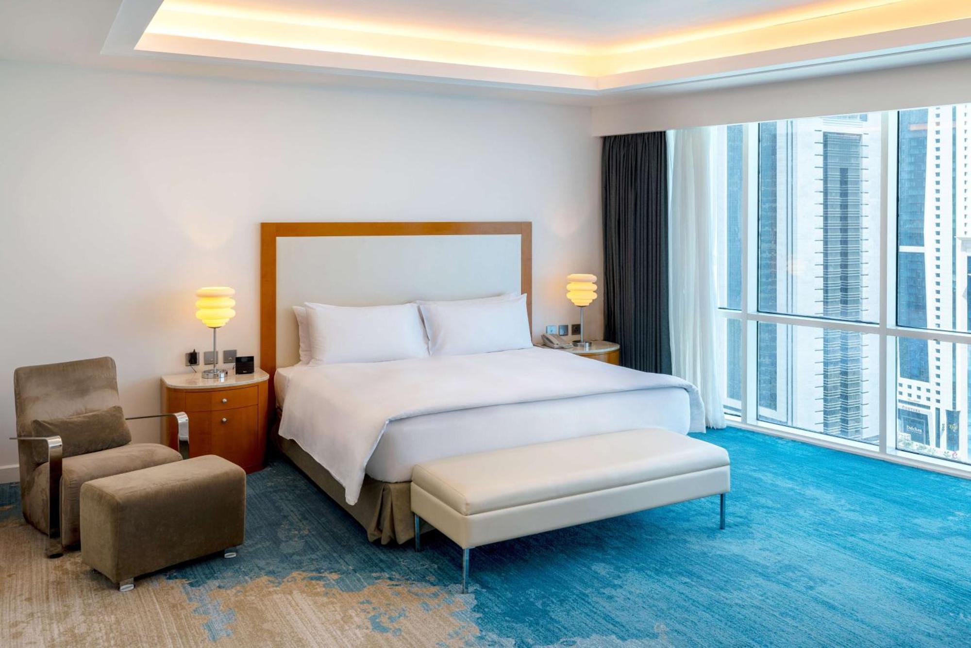 Hotel Hilton Ad Dawhah Esterno foto A bedroom at the hotel
